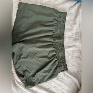 all in motion green shorts